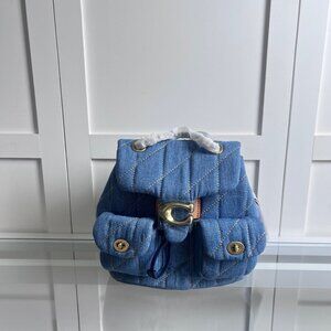 COACH women's diamond patterned quilted TABBY backpack